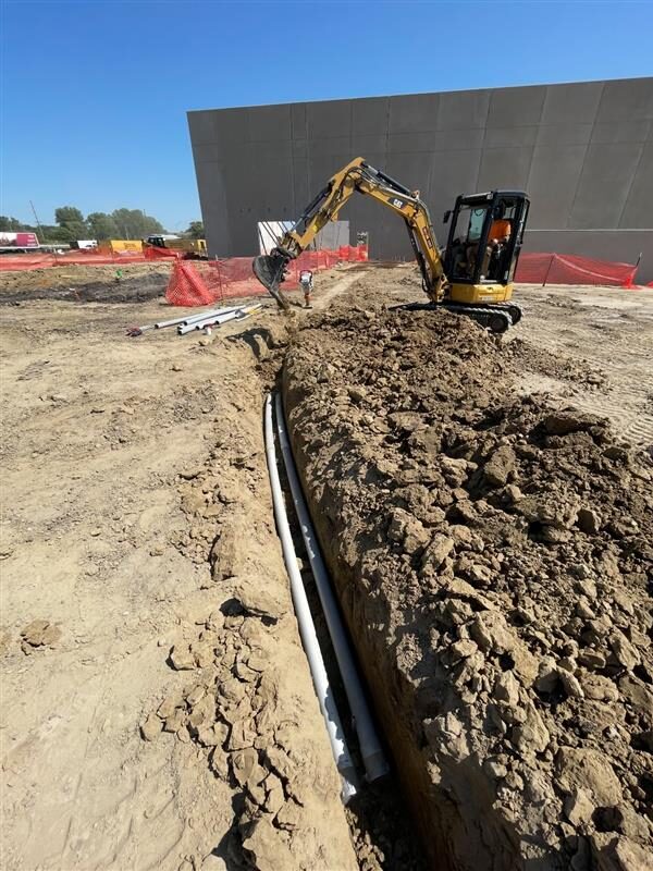 A picture of the outside of NMC Cat Dealership, in the beginning stages of construction.