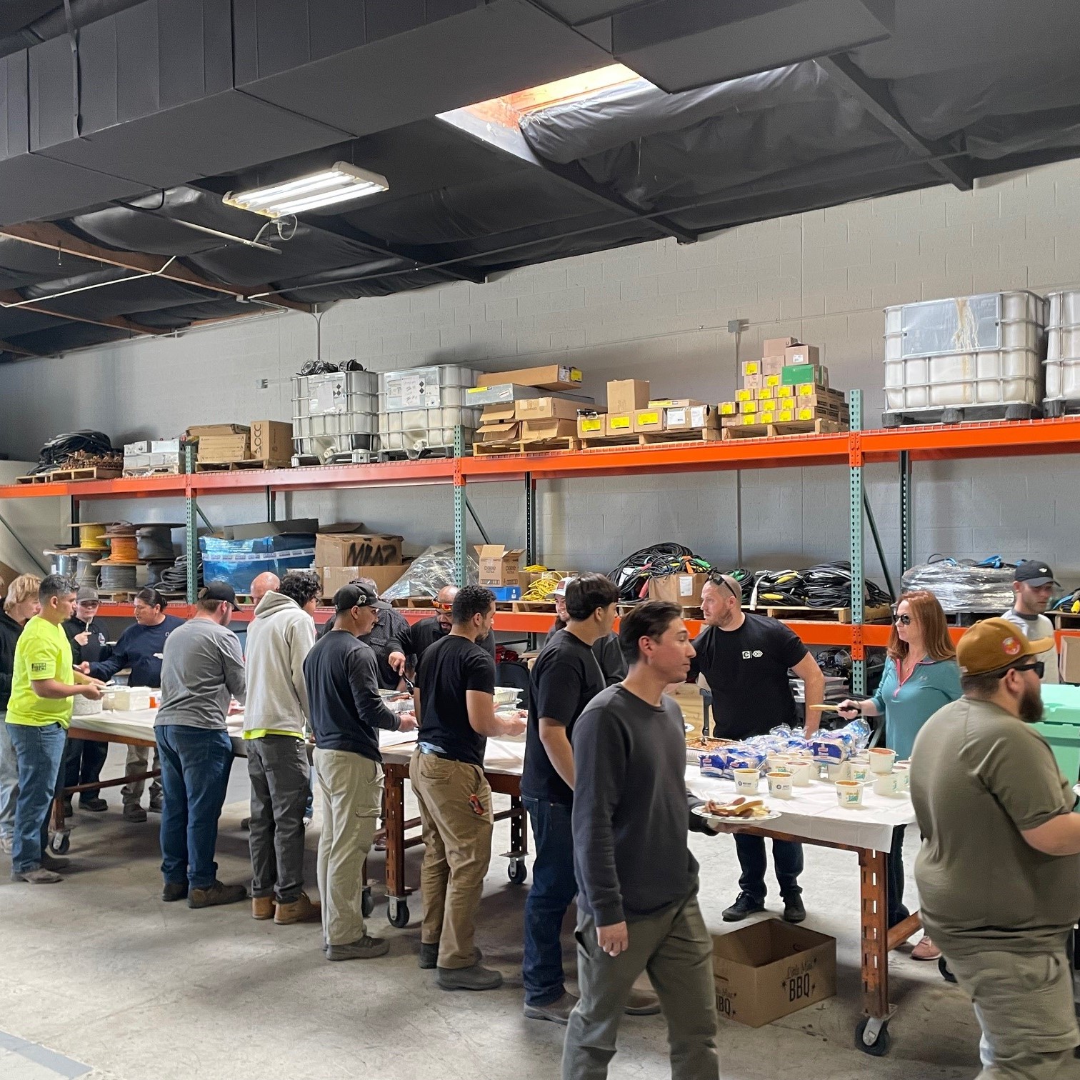 Employees enjoy a meal at a Field Appreciation Event.