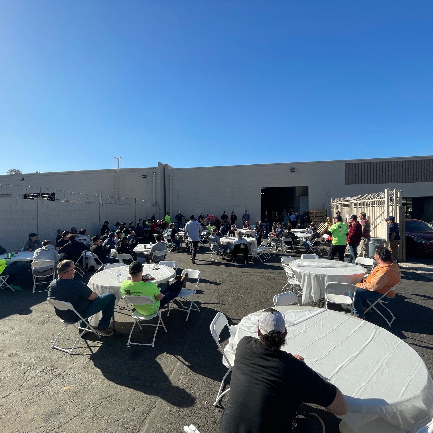 Employees enjoy a meal at a Field Appreciation Event.